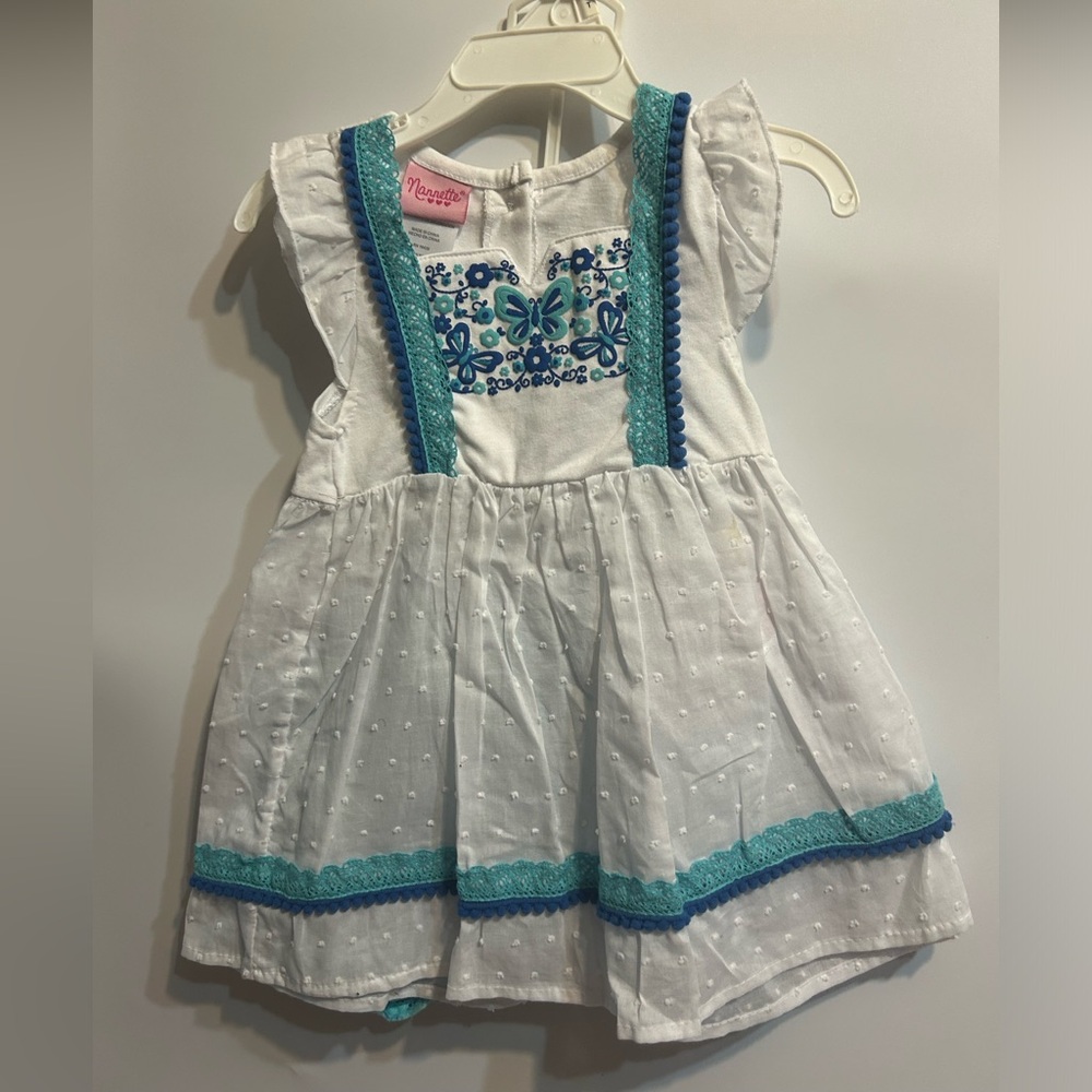 A two piece short set in blue and white